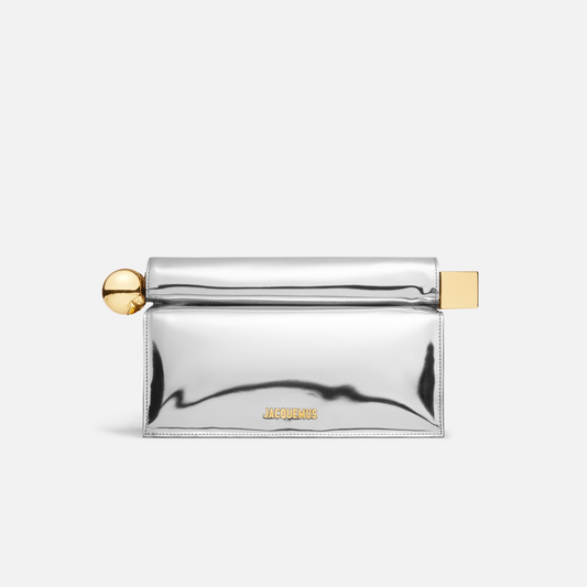 Mirror Your Style: Discover the Navirea Silver Statement Clutch