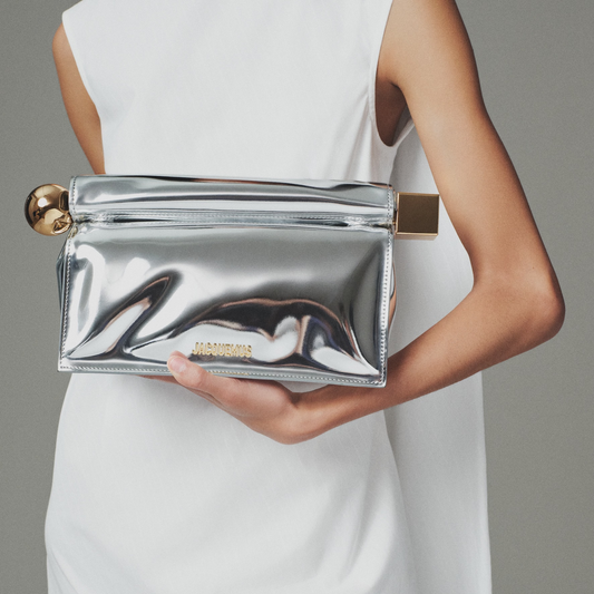 Shine with Confidence: The Navirea Metallic Silver Clutch for Every Occasion